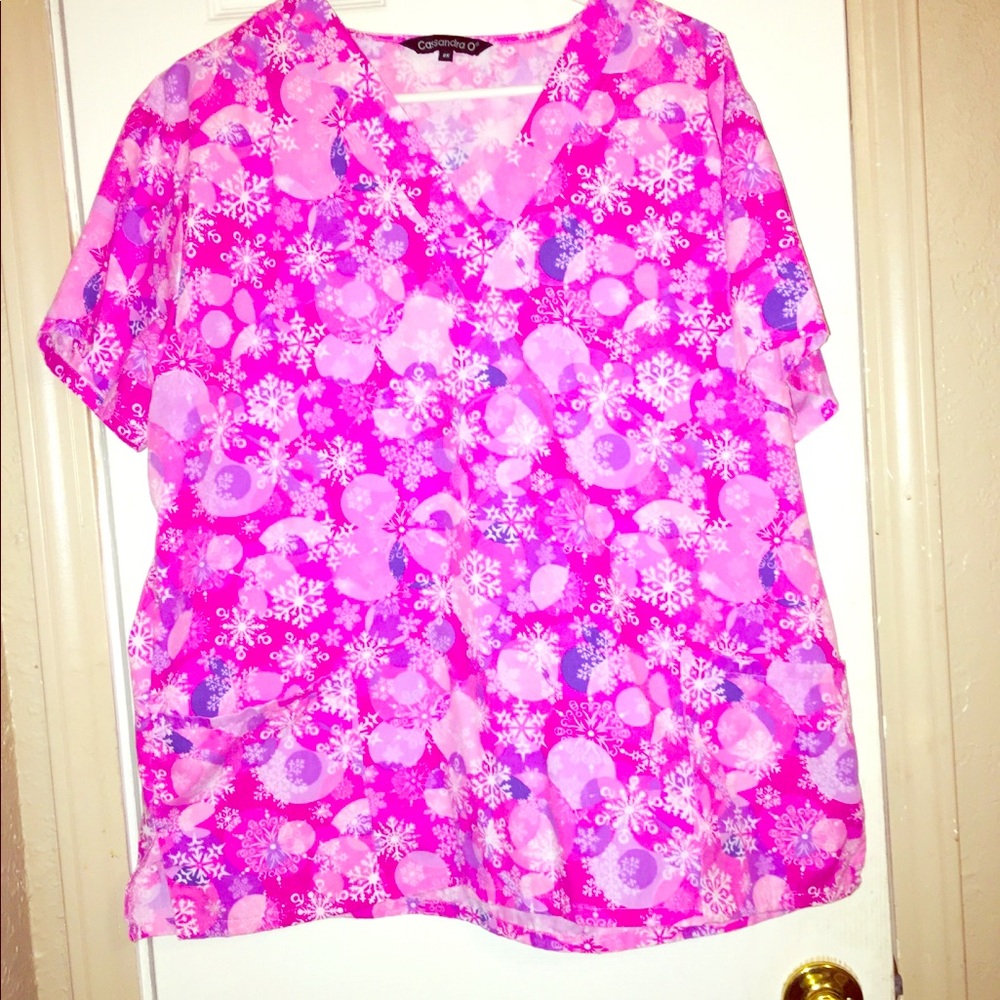 2x scrub tops.Willing to sell separately $12 a top